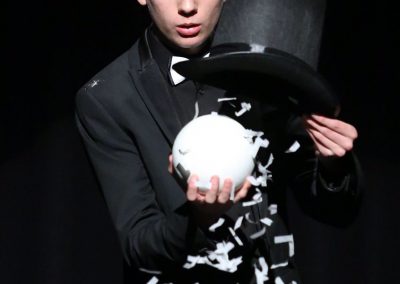 Dean Leavy performs a magic act with a sphere